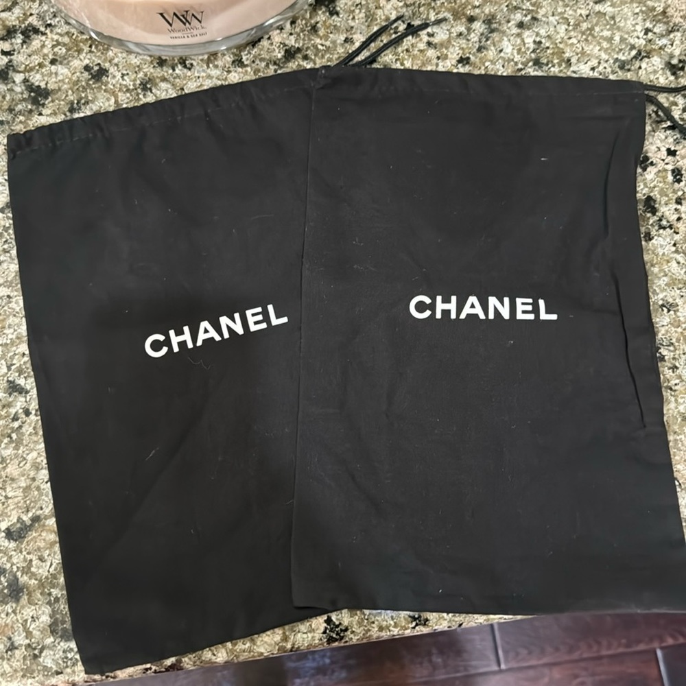 2 Chanel dust bags size 12.5x7.5 inc.